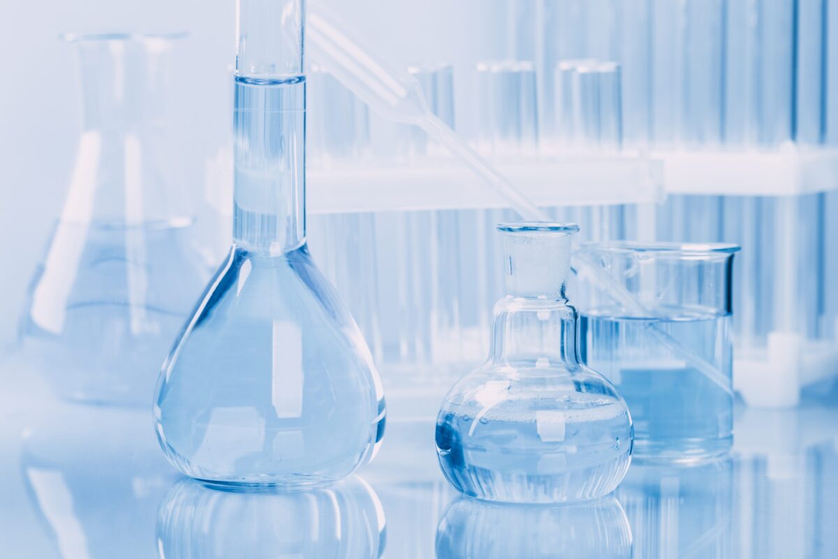 Laboratory glassware with test tubes and beakers, symbolizing opportunities in biomedical research investments and scientific innovation.